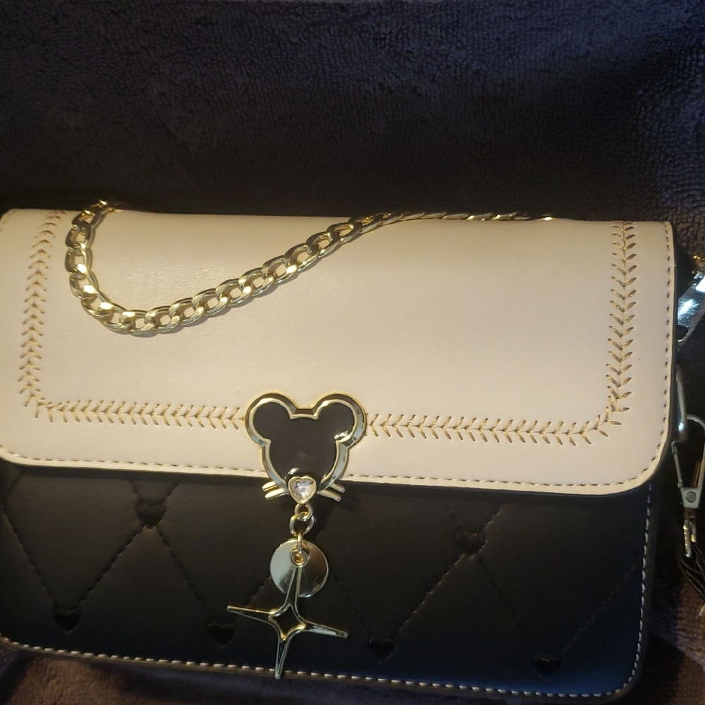 Chic Black and Cream Clutch with Gold Chain